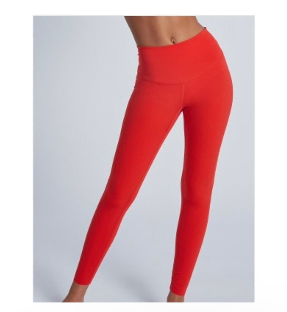 Revolve commando leggings in bright red with back zip pocket. Women’s medium